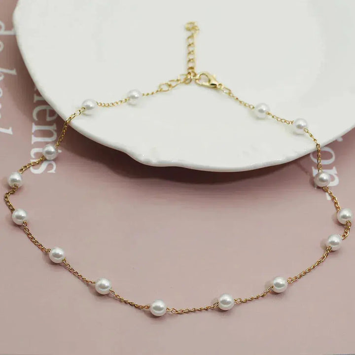 Gold pearl necklace